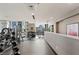 Well-equipped gym with free weights and fitness equipment with city views at 855 Peachtree Ne St # 3005, Atlanta, GA 30308