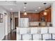 Modern kitchen with breakfast bar, granite counters, stainless appliances, and pendant lighting at 855 Peachtree Ne St # 3005, Atlanta, GA 30308