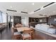 Condominium lounge with herringbone floors, large windows, and stylish decor at 855 Peachtree Ne St # 3005, Atlanta, GA 30308