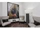 Relaxing sitting area features elegant chairs, ambient lighting, and decorative artwork at 855 Peachtree Ne St # 3005, Atlanta, GA 30308