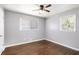 Inviting bedroom featuring hardwood floors, natural light, and spacious layout at 1753 Pounds Rd, Stone Mountain, GA 30087