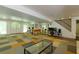 Spacious finished basement featuring recreational space, fitness equipment, and walkout to the exterior at 1760 Little Willeo Rd, Marietta, GA 30068