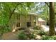 Charming two-story home featuring large windows, a well-maintained yard, and a two-car garage at 1760 Little Willeo Rd, Marietta, GA 30068