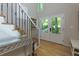 Entryway with staircase, hardwood floors, and view of the front door at 1760 Little Willeo Rd, Marietta, GA 30068