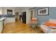 Open kitchen area with seating, stainless appliances, and hardwood floors at 1760 Little Willeo Rd, Marietta, GA 30068