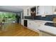 Kitchen with white cabinetry, stainless appliances, and a sliding glass door to a deck at 1760 Little Willeo Rd, Marietta, GA 30068