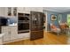 Kitchen boasts stainless appliances, and hardwood floors, with seating area at 1760 Little Willeo Rd, Marietta, GA 30068