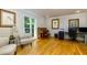 Bright living room with hardwood floors, natural light, and neutral paint colors at 1760 Little Willeo Rd, Marietta, GA 30068
