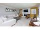 Comfortable living room boasts a stone fireplace, an ergonomic chair, and stylish art at 1760 Little Willeo Rd, Marietta, GA 30068