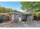 Cozy backyard featuring a fenced-in yard, patio, and a quaint brick and gray exterior at 1841 Thompson Ave, Atlanta, GA 30344