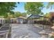 Spacious backyard featuring a large concrete patio, metal carport, and a fenced yard at 1841 Thompson Ave, Atlanta, GA 30344