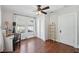 Bedroom featuring hardwood floors, a ceiling fan and natural lighting at 1841 Thompson Ave, Atlanta, GA 30344