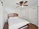 Bright bedroom showcasing wood floors, ceiling fan, and neutral color scheme at 1841 Thompson Ave, Atlanta, GA 30344