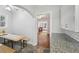 Bright dining room featuring granite countertops, neutral cabinets, and tile floors at 1841 Thompson Ave, Atlanta, GA 30344