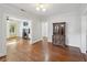 Living room showcasing hardwood floors and a decorative fireplace at 1841 Thompson Ave, Atlanta, GA 30344