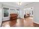 Living room with beautiful hardwood floors and large windows at 1841 Thompson Ave, Atlanta, GA 30344