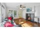 Bright living room with hardwood floors, fireplace, and an abundance of natural light at 1841 Thompson Ave, Atlanta, GA 30344