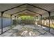 Covered patio with a hammock and grill for outdoor enjoyment at 1841 Thompson Ave, Atlanta, GA 30344