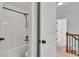 Bright white bathroom with a soaking tub and shower combination at 204 Arthur Hills Dr, Acworth, GA 30101