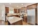 Kitchen featuring stainless steel appliances, granite countertops, and dark wood cabinets at 204 Arthur Hills Dr, Acworth, GA 30101