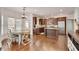 Well-lit kitchen featuring stainless steel appliances, dark cabinetry, and a breakfast nook at 204 Arthur Hills Dr, Acworth, GA 30101