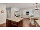 Open kitchen with granite countertops island and stainless appliances perfect for entertaining at 204 Arthur Hills Dr, Acworth, GA 30101