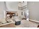 Spacious living room with hardwood floors, a staircase, and open flow to the kitchen at 204 Arthur Hills Dr, Acworth, GA 30101