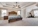 Spacious main bedroom with ceiling fan and bonus room for exercise equipment at 204 Arthur Hills Dr, Acworth, GA 30101