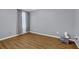 Clean bedroom with light grey walls and beautiful wood floors at 2416 Hurt Sw Rd, Marietta, GA 30008