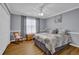 Cozy bedroom featuring neutral walls, wood floors, and a comfortable double bed at 2416 Hurt Sw Rd, Marietta, GA 30008