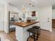 Eat-in kitchen boasting stainless steel appliances, wood countertops, and pendant lighting at 6974 Clearlake Ct, Peachtree Corners, GA 30360