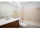 Bathroom featuring a shower-tub combo and large mirror at 1306 Red Deer Way # 246, Alpharetta, GA 30022
