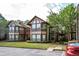Charming condo complex with well-maintained landscaping and ample parking at 1306 Red Deer Way # 246, Alpharetta, GA 30022