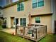Exterior backyard view of the deck, which is perfect for outdoor entertainment and relaxation at 220 Baltimore Ave, Stockbridge, GA 30281