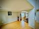 Spacious living room with hardwood floors that leads to dining area and floods with natural light at 220 Baltimore Ave, Stockbridge, GA 30281