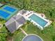 Aerial view of community amenities including pool, tennis courts, clubhouse, and lounge areas at 4104 Glenaire Nw Way, Acworth, GA 30101