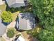 Birds eye view of roof, driveway, landscaping, and surrounding neighborhood at 4104 Glenaire Nw Way, Acworth, GA 30101