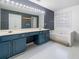 Updated bathroom with double vanity, soaking tub and natural light at 4104 Glenaire Nw Way, Acworth, GA 30101