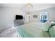A spacious bedroom offers a ceiling fan, walk-in closet, and attached bathroom at 4104 Glenaire Nw Way, Acworth, GA 30101