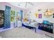 Bright bedroom with playful decor, featuring shelves and storage solutions at 4104 Glenaire Nw Way, Acworth, GA 30101