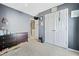 Bedroom with plush carpeting, double closets and a view of the front yard at 4104 Glenaire Nw Way, Acworth, GA 30101