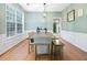 Classic dining room featuring a spacious table, bench, and view of the outdoors at 4104 Glenaire Nw Way, Acworth, GA 30101
