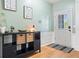 Bright entryway with wood floors, stylish decor, and ample storage at 4104 Glenaire Nw Way, Acworth, GA 30101