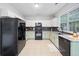 Well-lit kitchen with stainless steel appliances, modern cabinetry, and granite countertops at 4104 Glenaire Nw Way, Acworth, GA 30101
