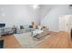 Bright living room with tall ceilings and wood floors at 4104 Glenaire Nw Way, Acworth, GA 30101