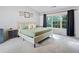 Carpeted main bedroom with window view and natural light at 4104 Glenaire Nw Way, Acworth, GA 30101