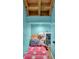 Cute and colorful basement nook space with playful decor and open ceiling at 7155 Bannister Park Ln, Cumming, GA 30028