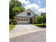 Charming single-Gathering home with a brick facade and a two-car garage at 10110 Malcolm Ct, Covington, GA 30014