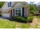 Attractive single-Gathering home with brick and siding, enhanced by neat landscaping at 10110 Malcolm Ct, Covington, GA 30014