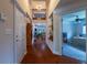 Welcoming foyer with high ceilings and hardwood floors leading into the home at 10110 Malcolm Ct, Covington, GA 30014